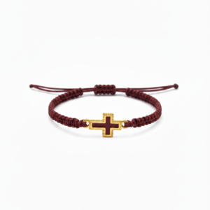 Χειροποίητο μπορντό μακραμέ με μεταλλικό χρυσό στοιχείο σε σχήμα σταυρού με μπορντό την εσωτερική πλευρά του